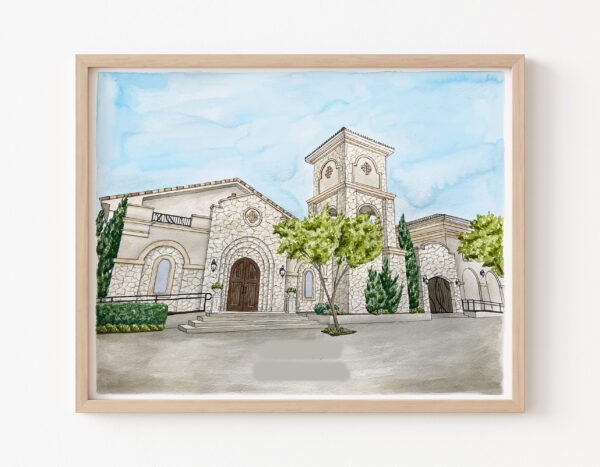 Framed watercolor painting of a church and event space to be used as a wedding guest book.